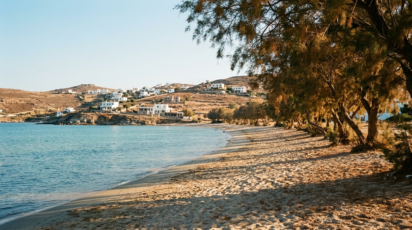 A shaded wooden taverna table set with fresh bread and water overlooking a calm shallow sandy bay in Greece